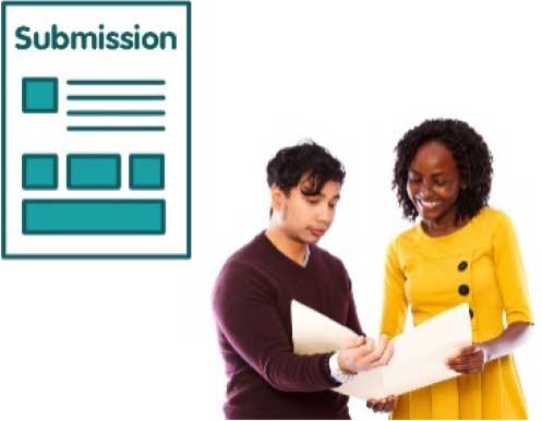 Two people looking at a document