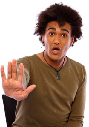 Man with his hand up in a stop motion