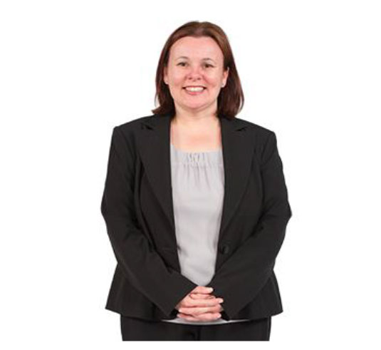 A lawyer smiling