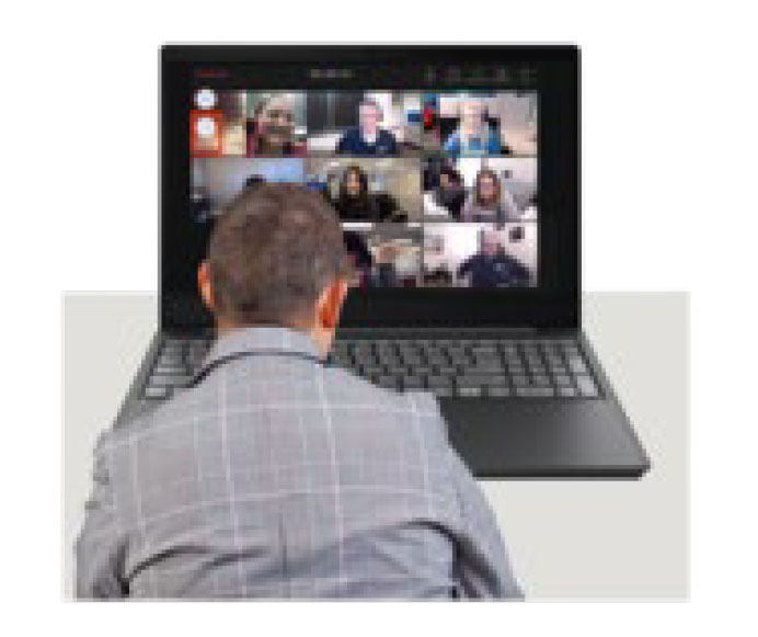 Person sitting in front of a laptop