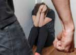 clenched fist and person cowering in fear